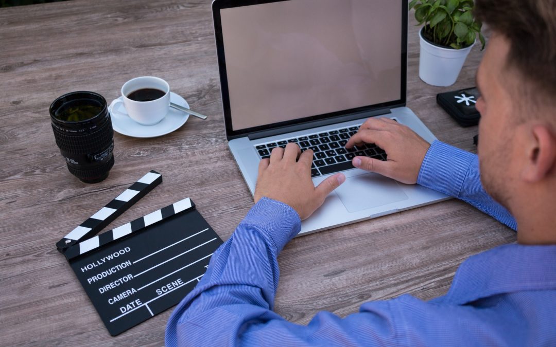 Filmmaker on laptop - How to Structure a Short Film